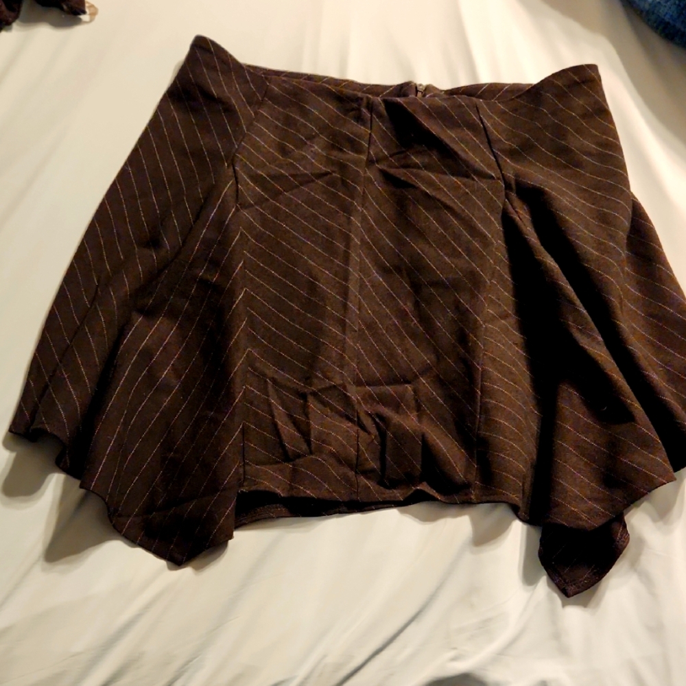 Pinstriped Mini Skirt With An Asymmetrical Hem Detail And Zip Close. NWT